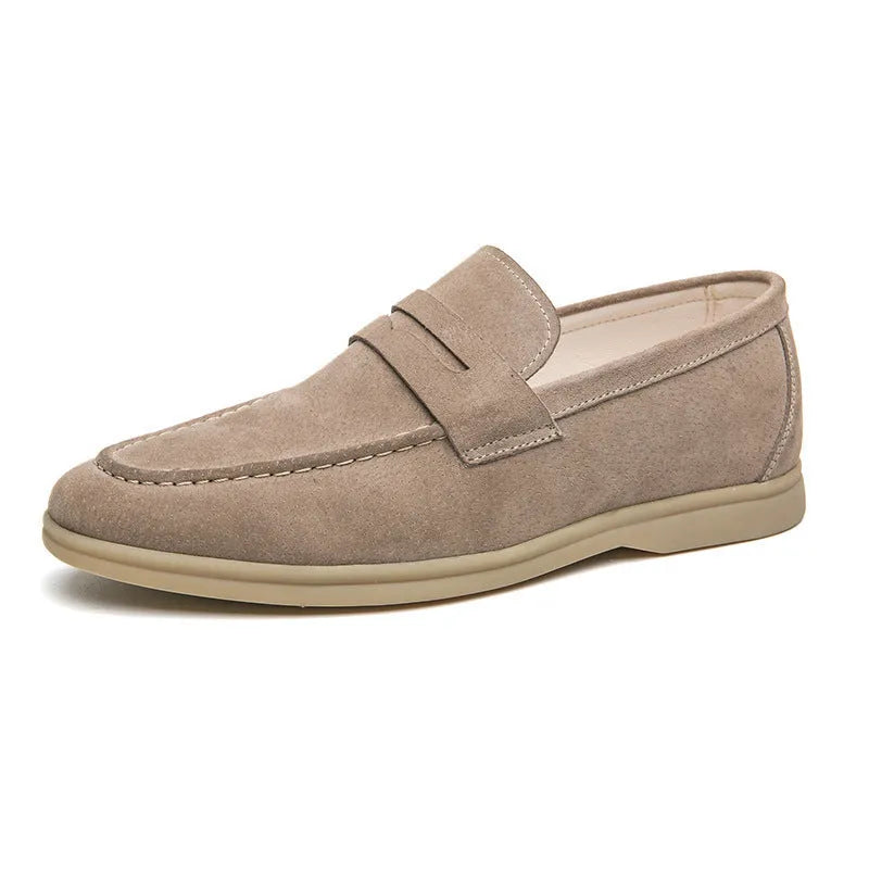 Men's black leather slip-on casual shoes with a round toe and mid-height heel on a rubber sole.