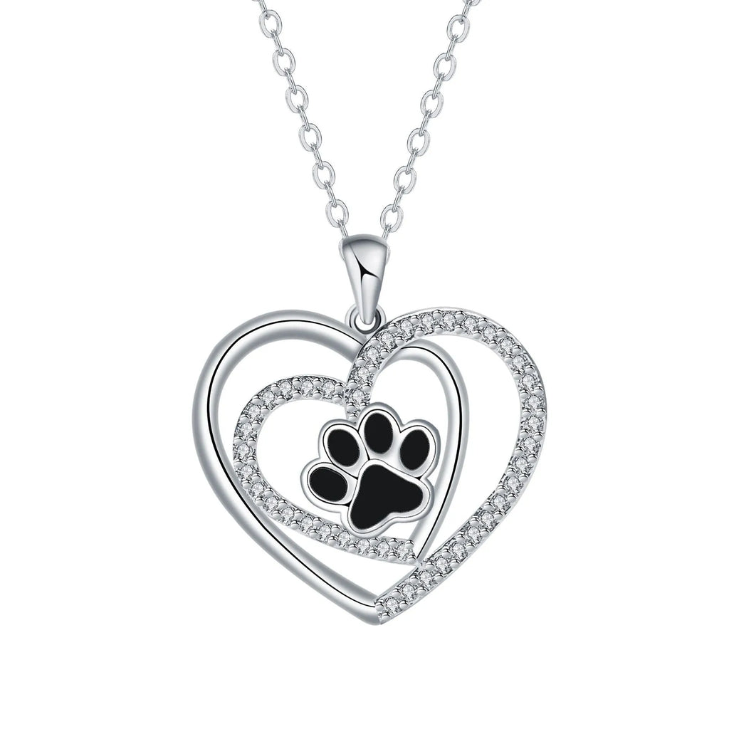 Women's copper heart-shaped pendant necklace with detailed dog's paw prints and cross chain
