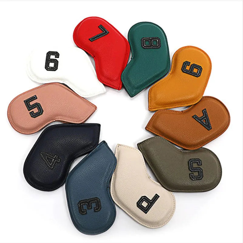 Set of 10 assorted digitally printed PU golf club head covers on a golf bag.