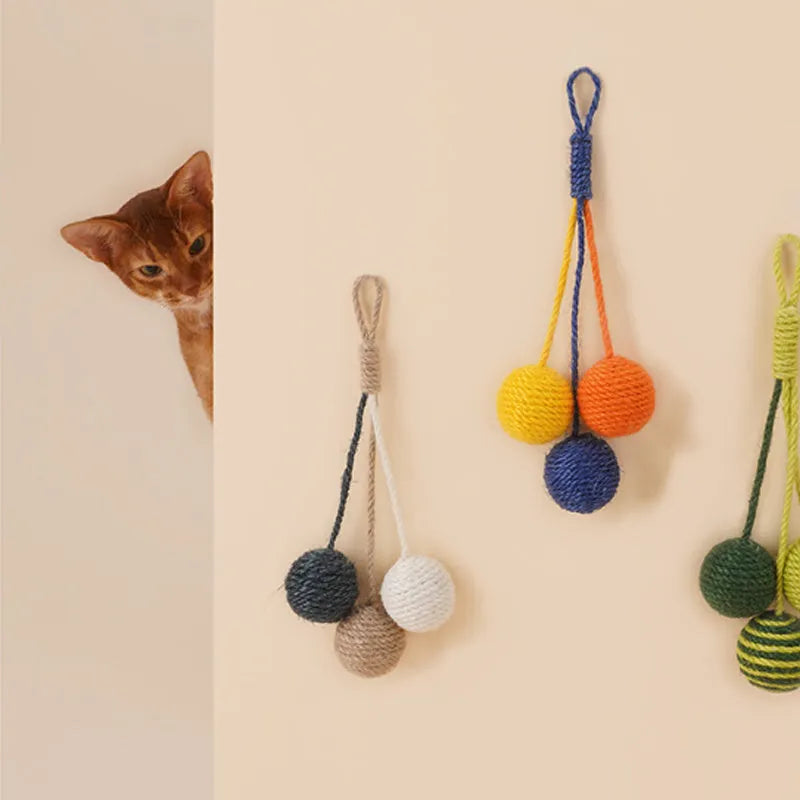 Blue and green cat toy set with a teaser stick and a catnip ball on a white background.