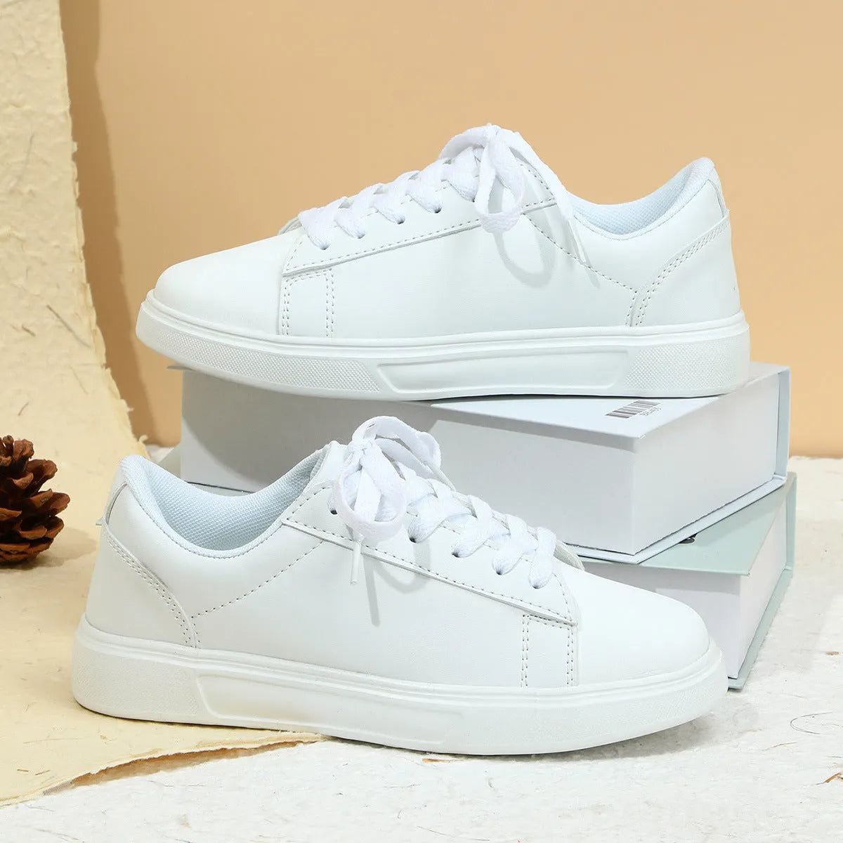 Beige brown platform skateboard sneakers with cross belt design and rubber sole