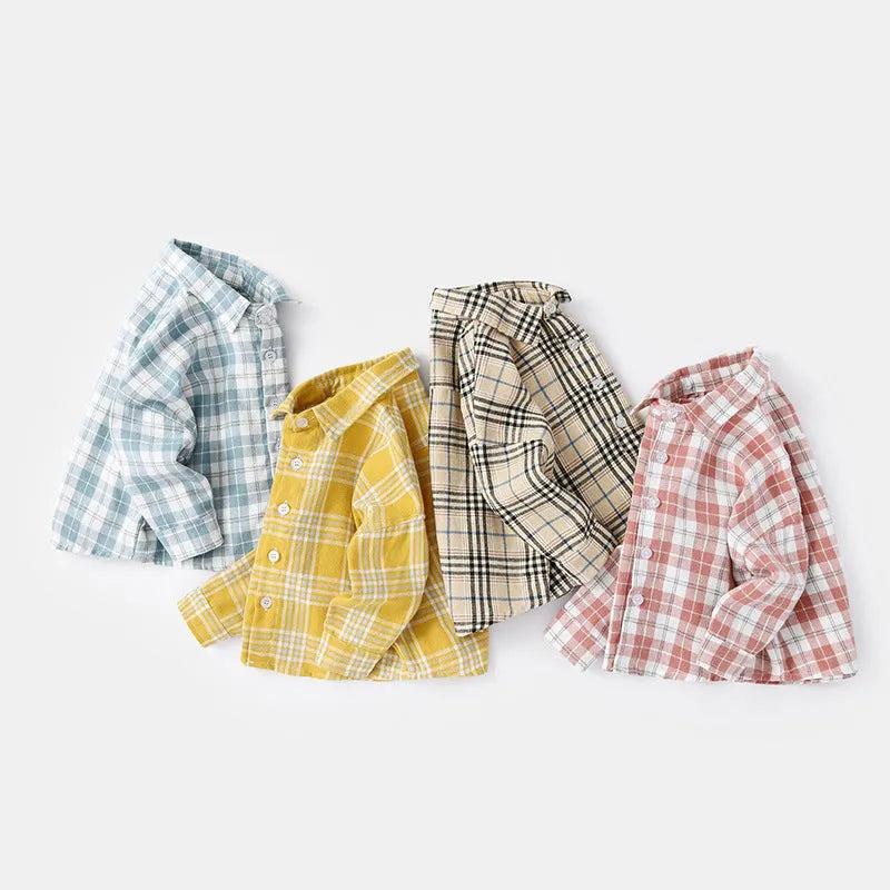 A boy's casual cotton lattice shirt with animal patterns, shown in khaki, light blue, pink, or yellow colour options.