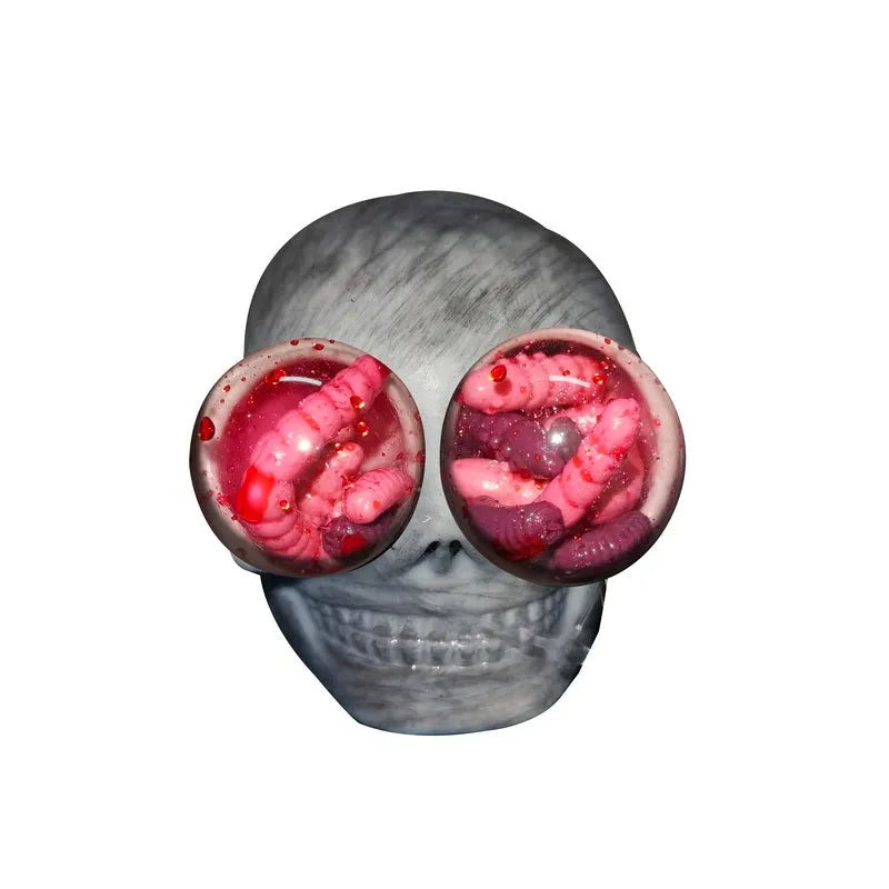 Grey Halloween pinch music decompression ball with skeleton monster face on white background