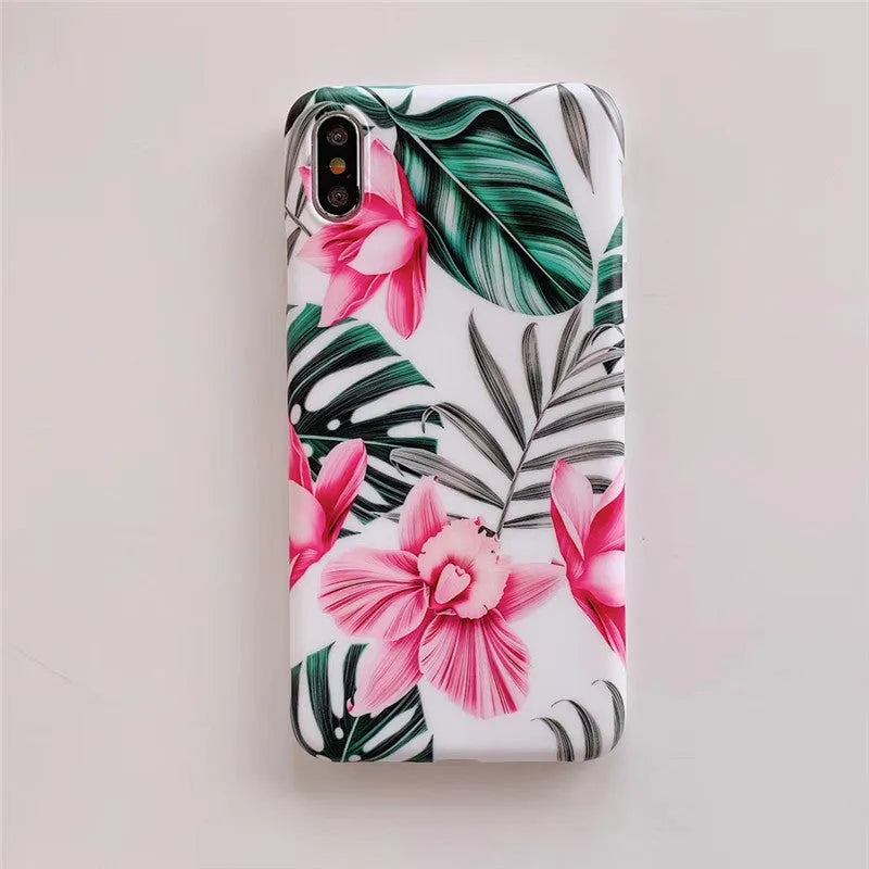 Pink floral design TPU phone case for iPhone on a table