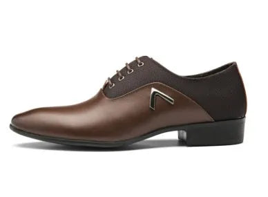 Men's black Oxford shoes with a low upper, brogue detailing, and a rubber sole.