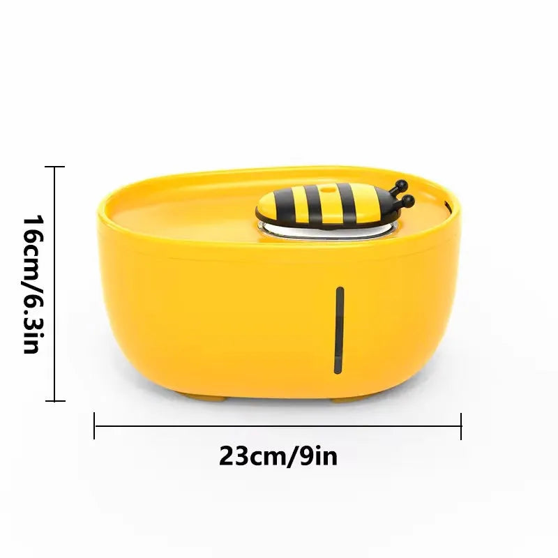 Yellow USB-powered cat water fountain with filter on anti-slip base.