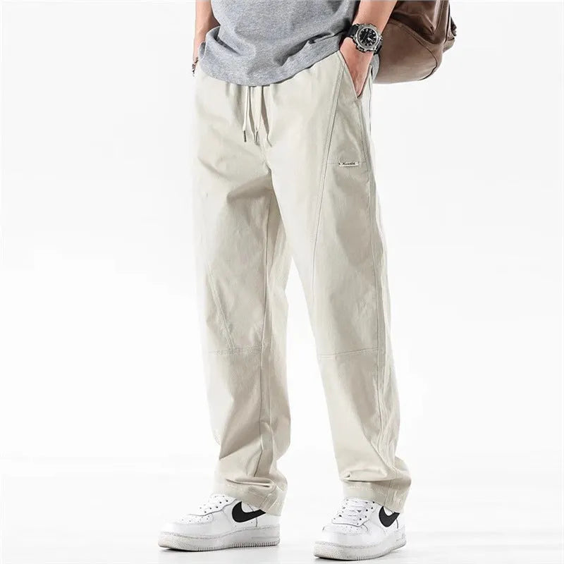 Cotton wide-leg trousers in milky white and black colours with loose fit design