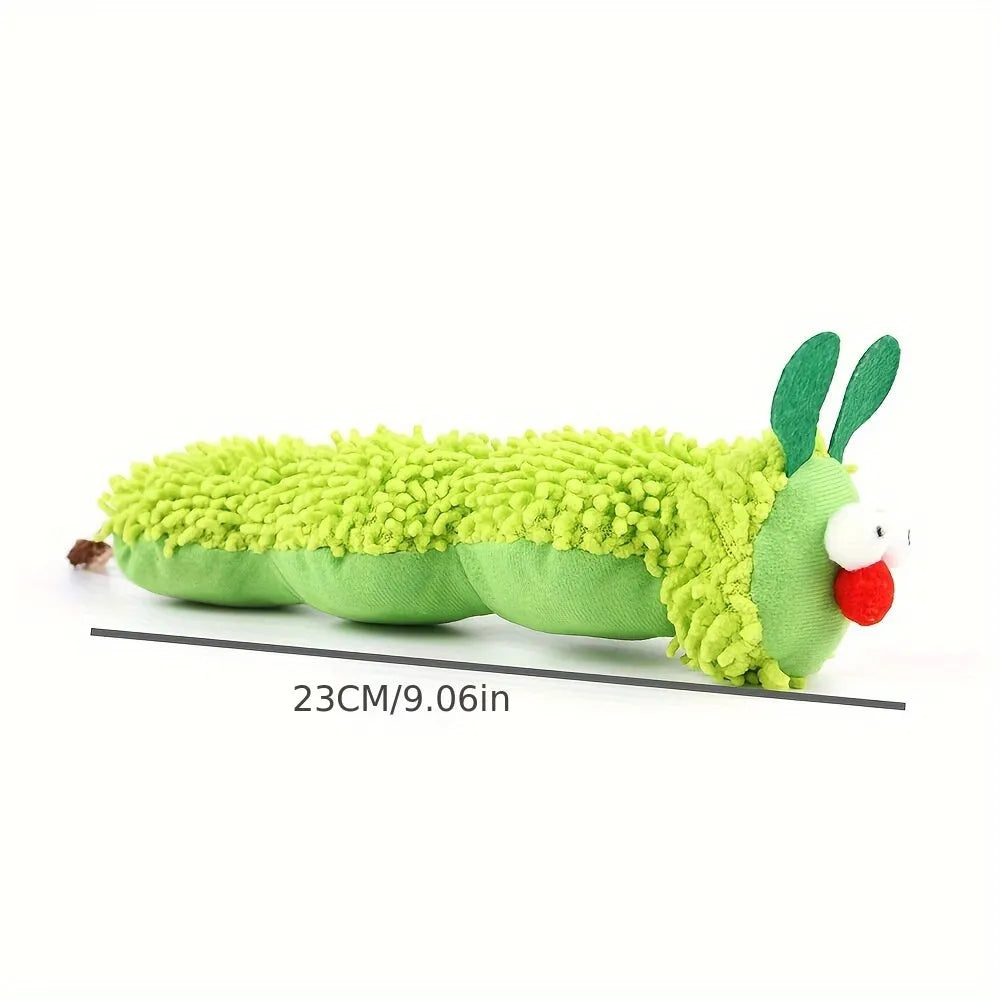 Green interactive plush cat toy pillow with rechargeable electronic mechanism, shown next to scale indicating 24 cm length.