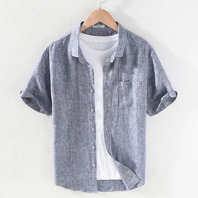 Men's light grey linen short sleeve shirt with a square collar, shown unbuttoned in a cardigan style.