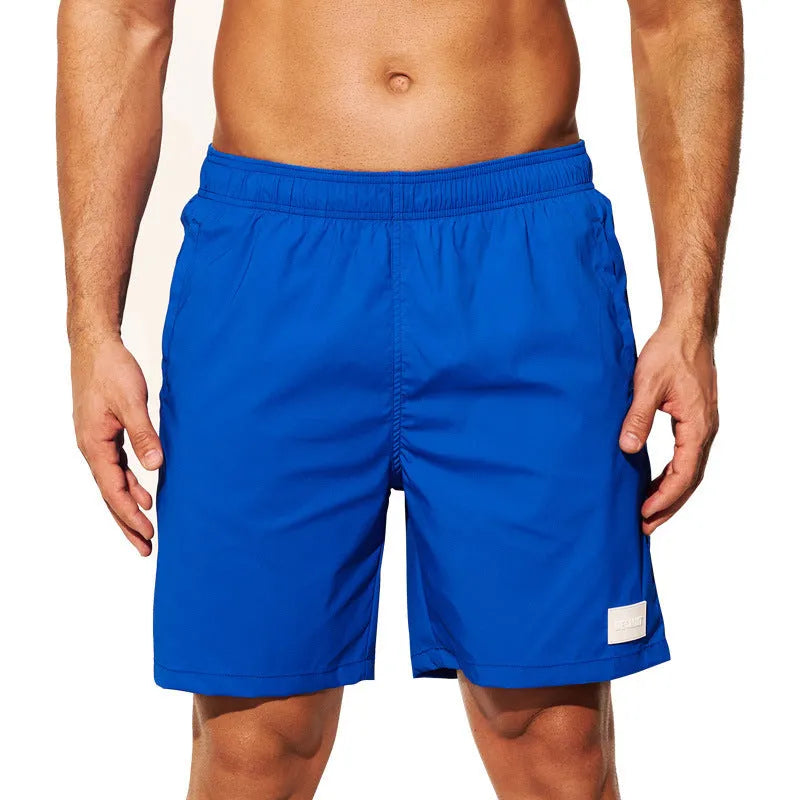 Men's quick-dry nylon sports shorts in straight-leg style available in multiple colours