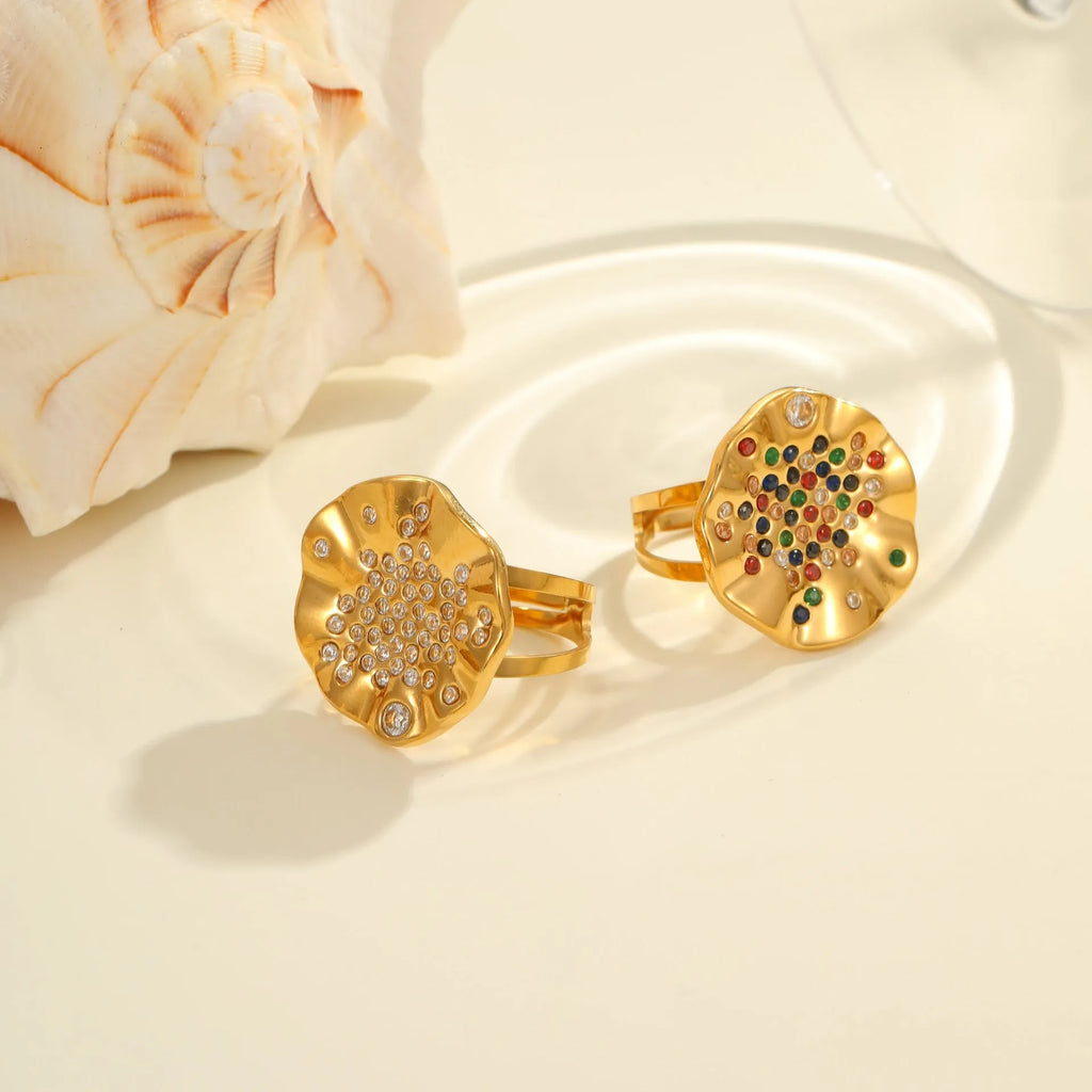 Geometric stainless steel open mouth ring with pleated inlaid design and crystal accents