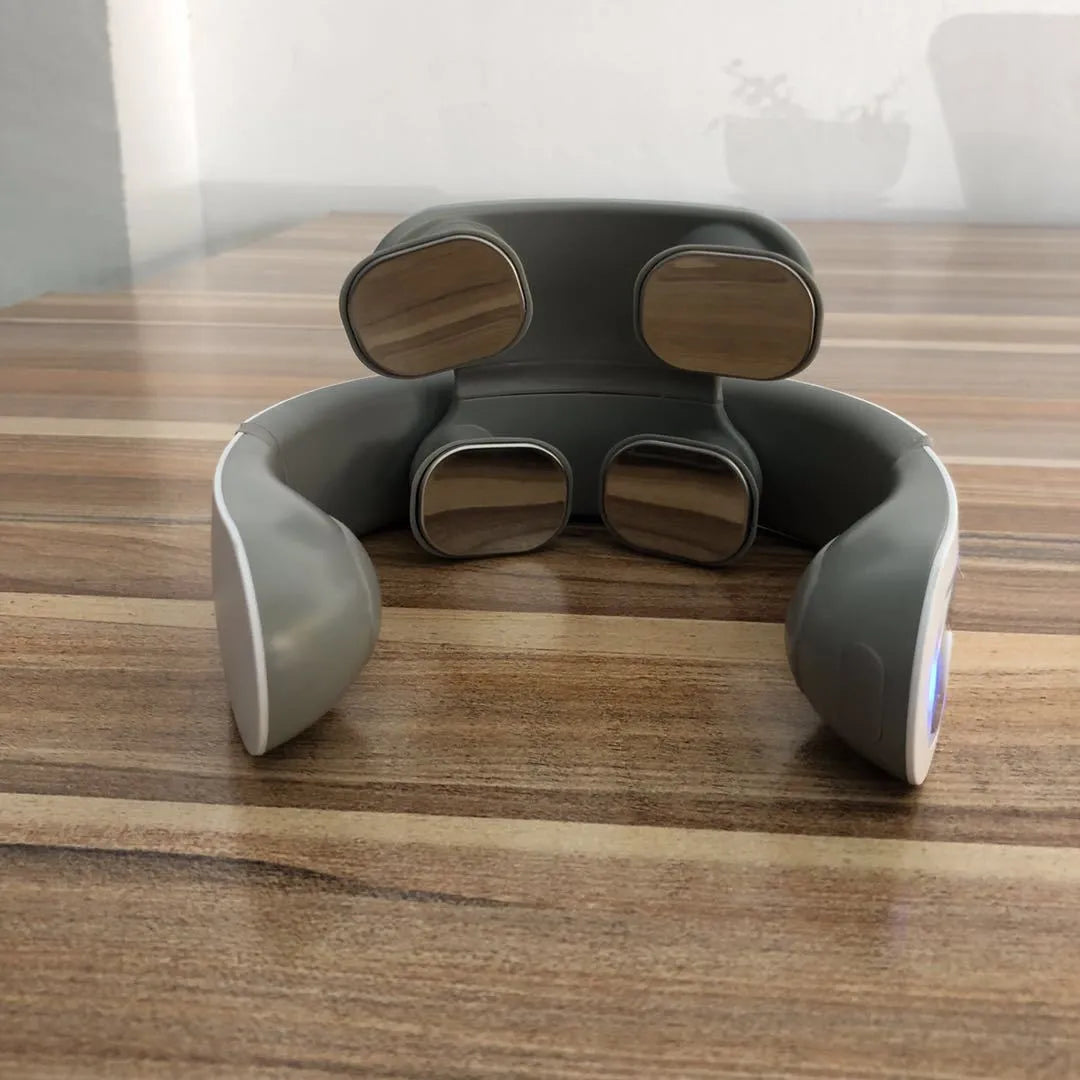 White four-head shoulder neck massager with charging power supply for domestic use
