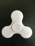 Bluetooth speaker music fidget spinner EDC toy in white, showing portable ABS build
