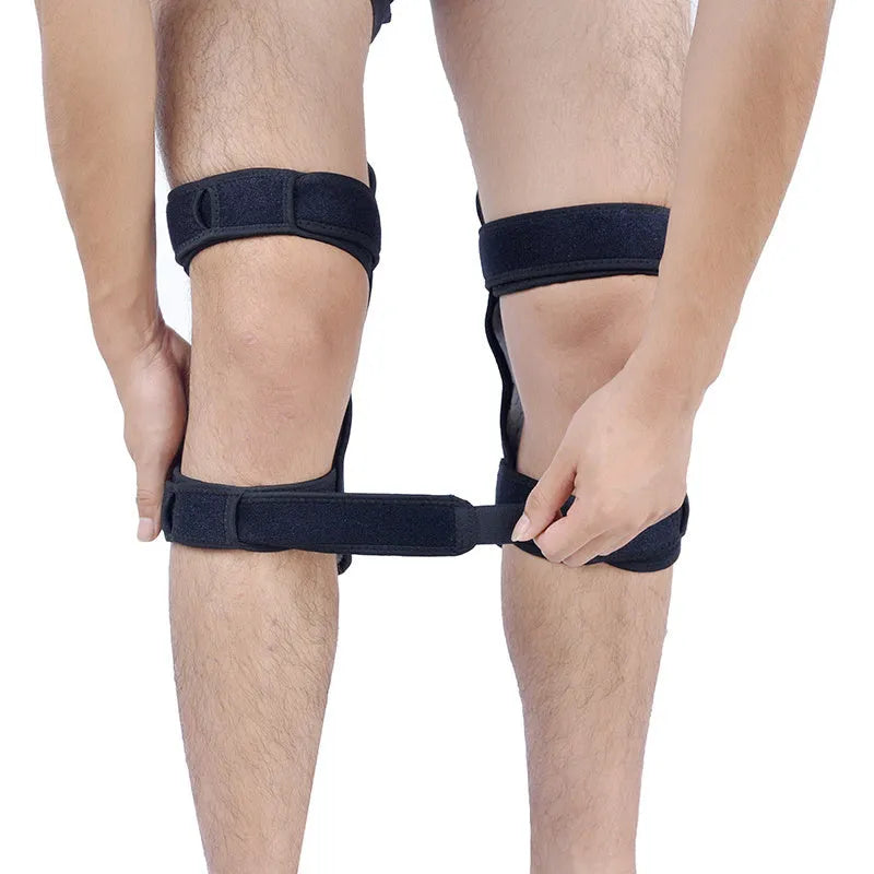 Adjustable spring knee brace for patella support in black colour with straps and venting holes