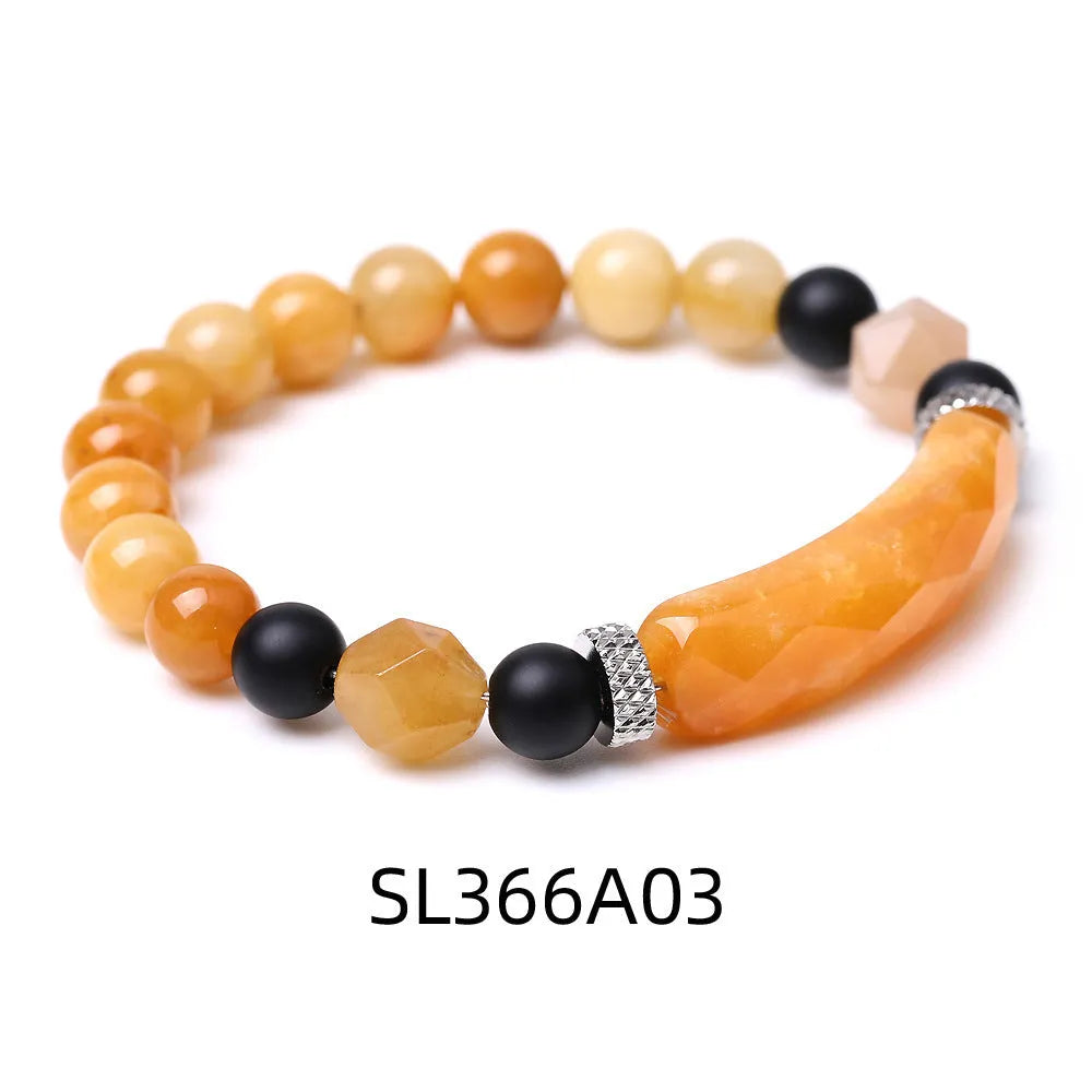 Handmade black agate diamond cut bracelet with geometric fan design on wrist