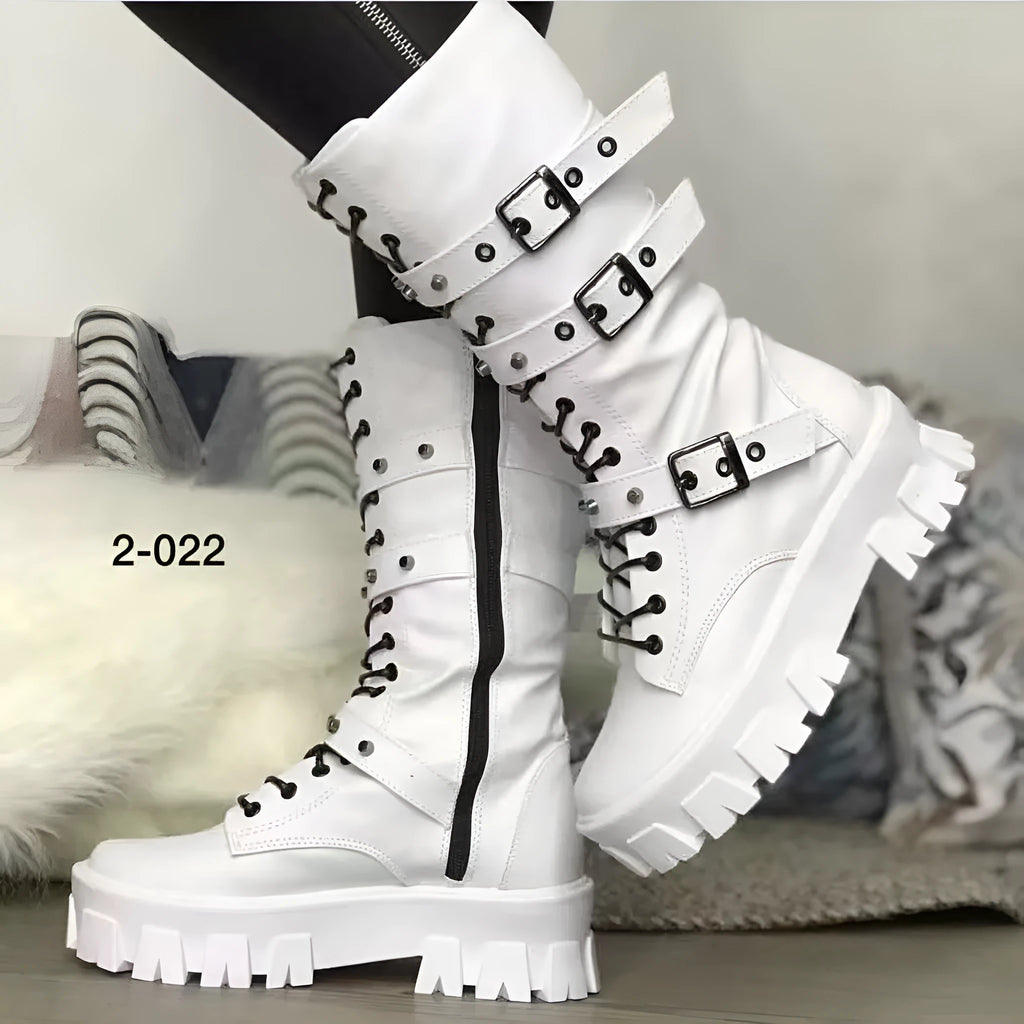 Women's black mid-calf boots with metal buckle straps and a side zipper on a white background.