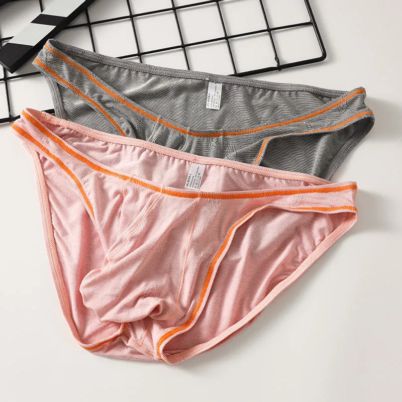 Men's ice silk modal butt-lift underwear in multiple colours showing seamless knitting construction