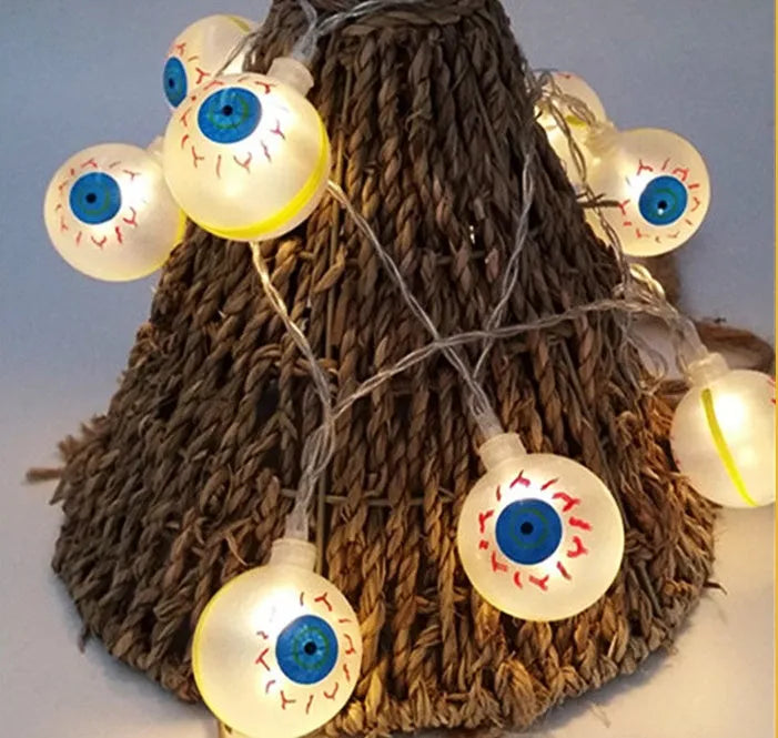 Halloween battery LED string lights showing bat, pumpkin, ghost and spider shapes on a 1.2 metre white wire.