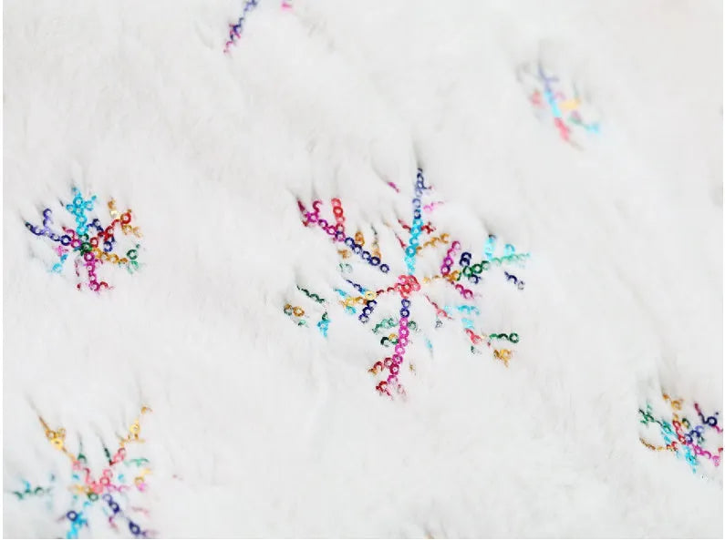 Christmas tree skirt with silver sequin embroidery Christmas tree design on white background