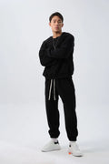 Men's loose fit polar fleece sports suit in army green, showing jacket and trousers.