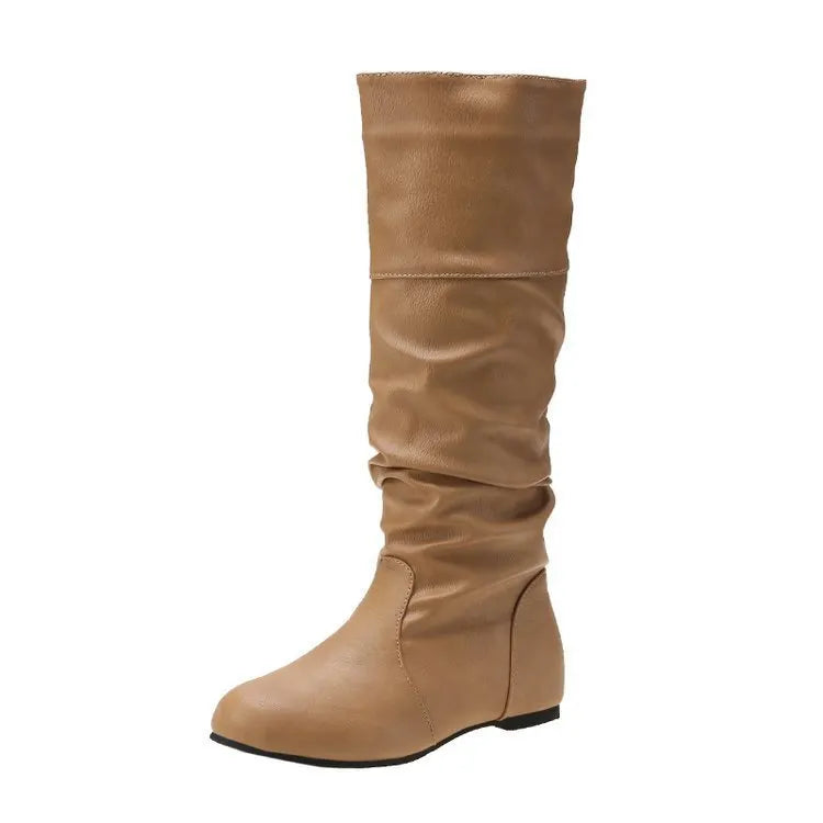 Women's flat-heel slip-on long boots in black with a round toe and high shaft.