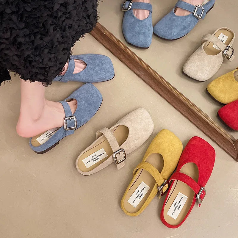 Women's flat apricot PU half slippers with closed square toe and rubber sole.