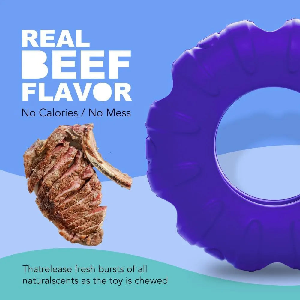Blue beef-flavoured rubber tyre dog chew toy with oval openings for slow feeding.