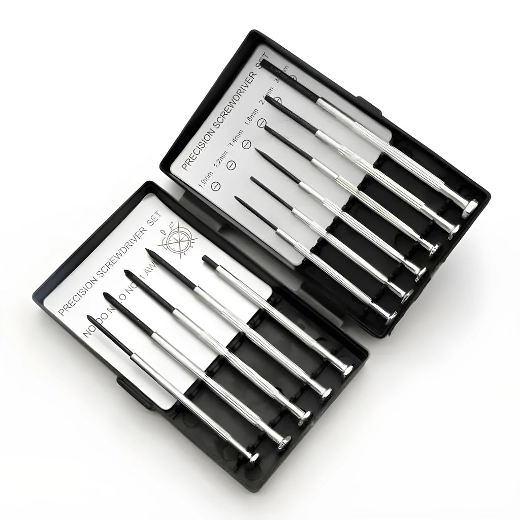 TH-6177 11 piece clock screwdriver set with cross and slotted heads on a workbench