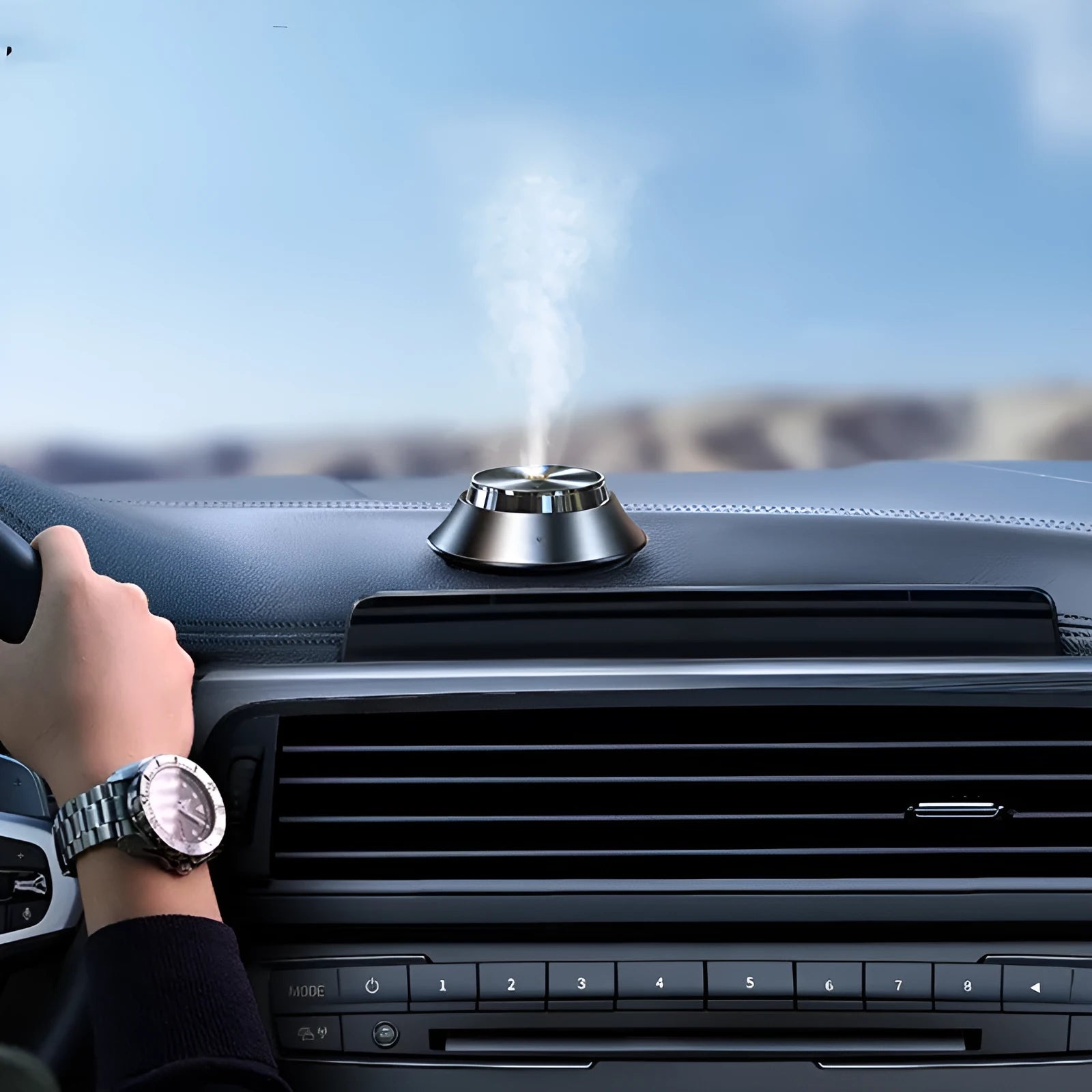 Black metal car aromatherapy device with butterfly design and USB cable connection