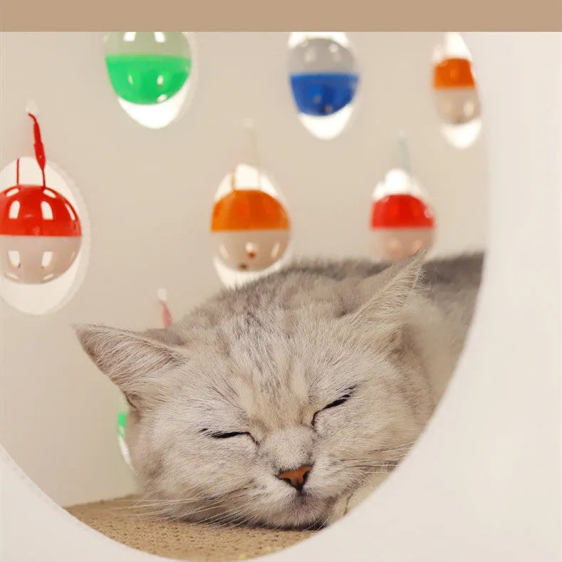 Integrated plastic cat scratch board house with a bell ball toy and connecting tunnel.