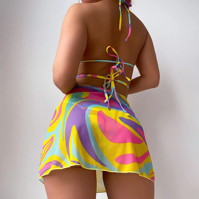Yellow striped women's halter lace-up swimsuit set with matching skirt and shorts