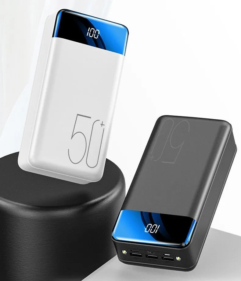 Large capacity 50000mAh power bank in black plastic case with three USB output ports
