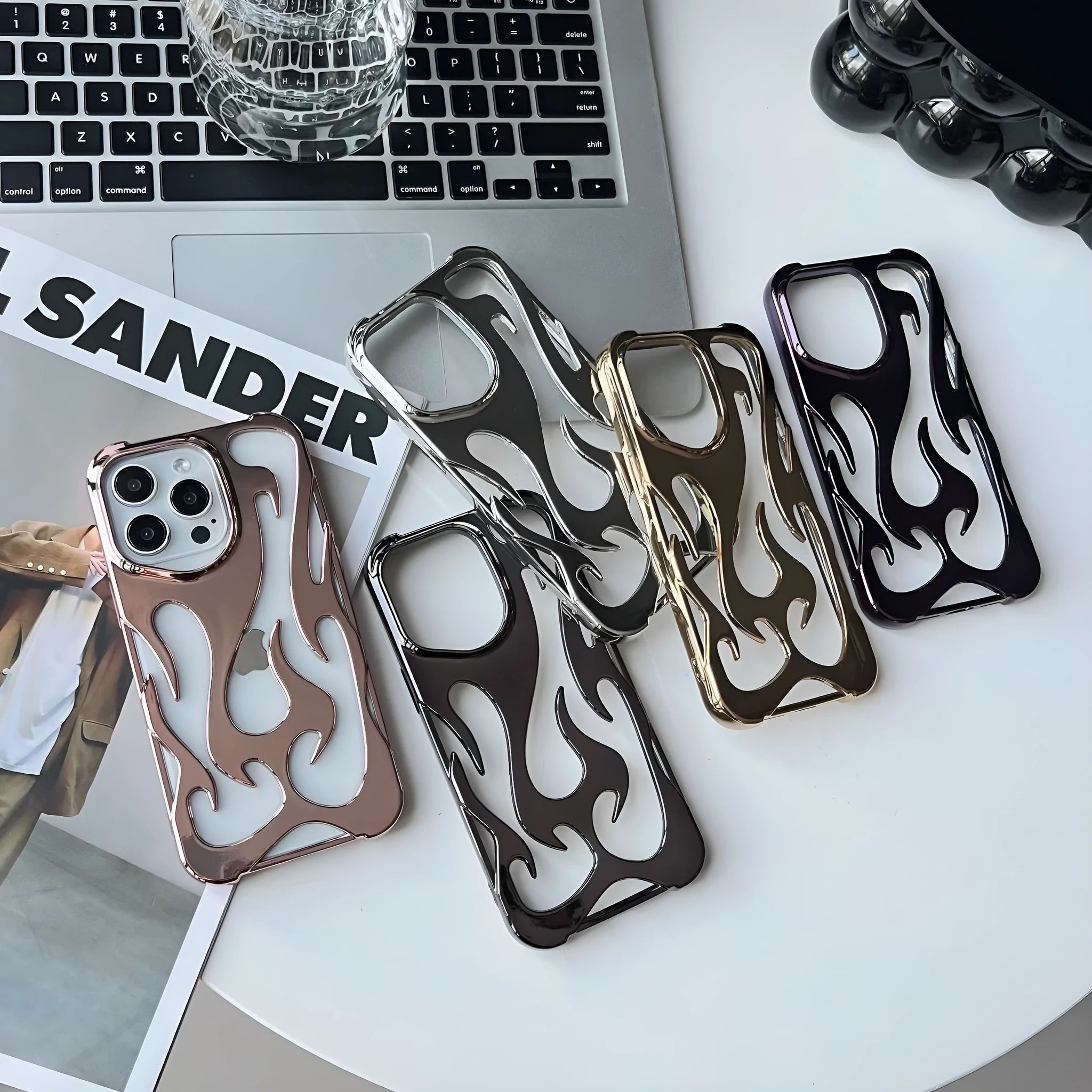 Electroplating hollow flame pattern design TPU phone case for Apple iPhone in metallic colours.