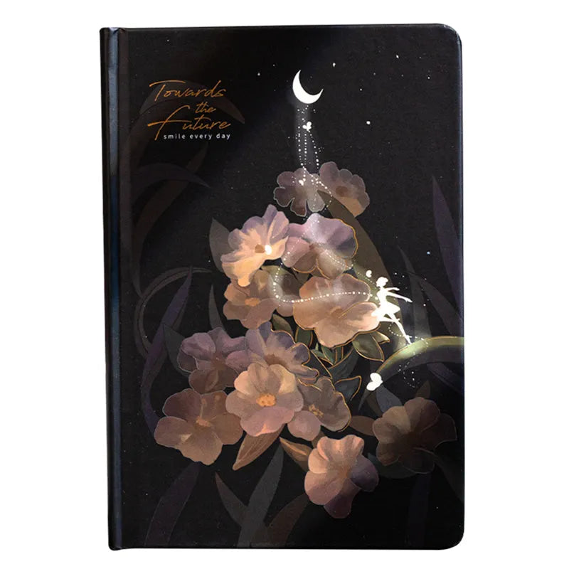 A5 notebook with luminous cover open to show pages filled with colour illustrations