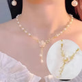Silver-toned alloy necklace with pearl flower Q9 pendant and rose decoration elements