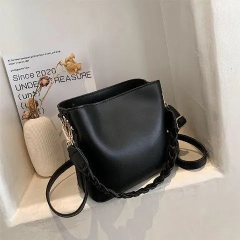 Retro style woven PU crossbody bucket bag in neutral colour
