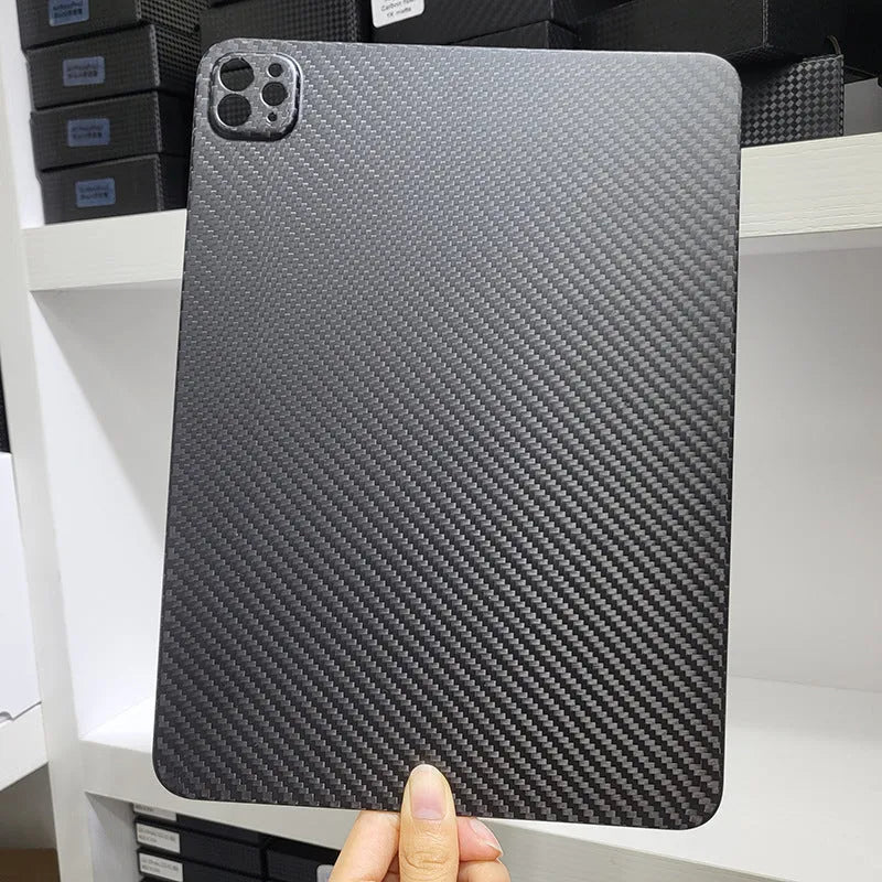 Genuine carbon fibre flat protective cover for Apple iPad Pro 11 with embossed plaid pattern.