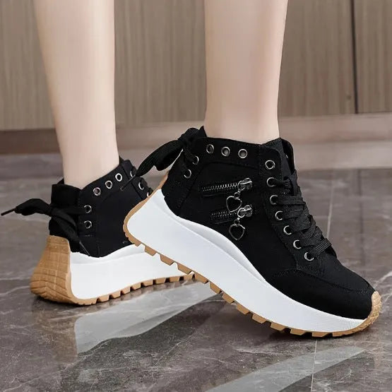 Women's high-top platform shoes in black artificial PU with round toe and lace-up design.