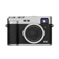 Black 5K HD digital camera with front and rear lenses, optical viewfinder, and a 2.88-inch screen on the back.