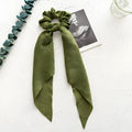 Dark green cloth hair ring formed into a large intestine ring shape, a floral-inspired women's hair accessory.