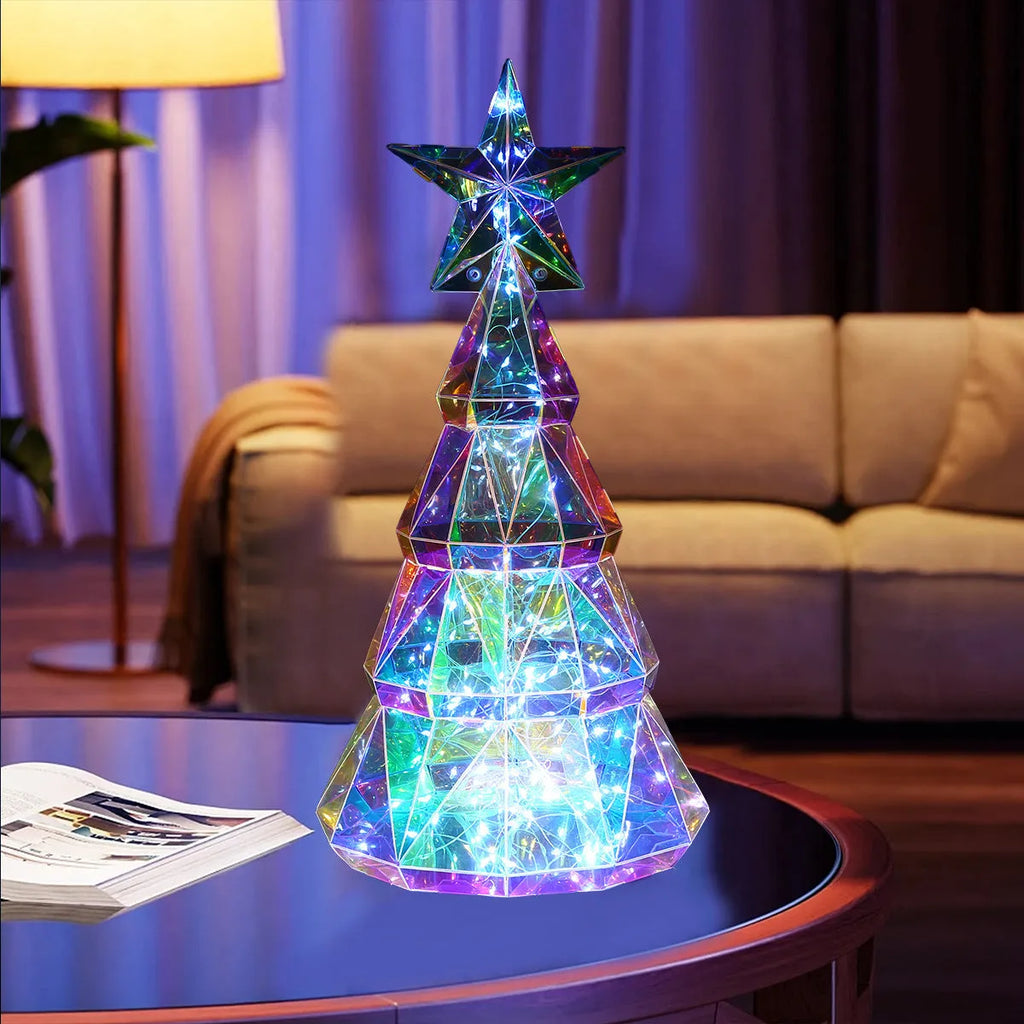 Colourful cartoon-style LED Christmas tree decorative toy on a tabletop