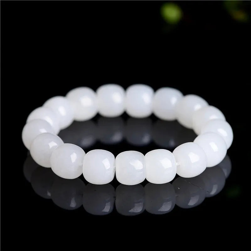 White jade barrel beads bracelet on wrist showing Hetian jade beads in casual unisex design
