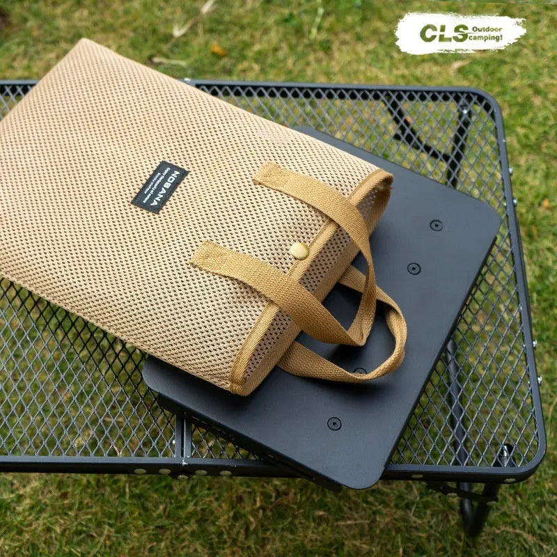 CLS aluminium folding camping stool shown in army green, converted into a small table.