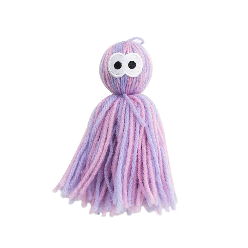 Wool ball cat toy with hanging loop in blue grey, pink and blue, and pink purple colour options