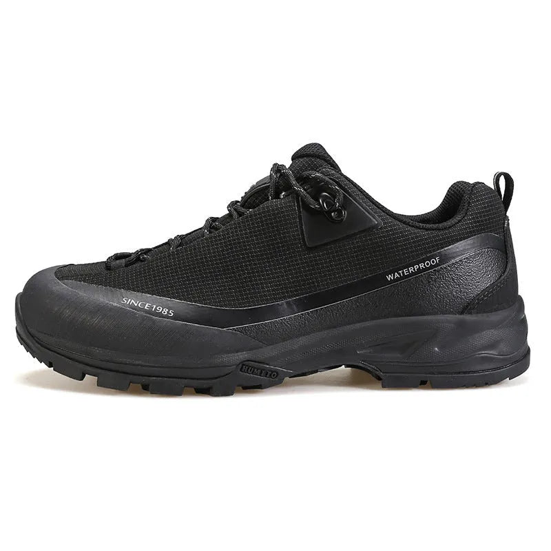 Men's low-top hiking boots with round toe design and lace-up closure in various colours