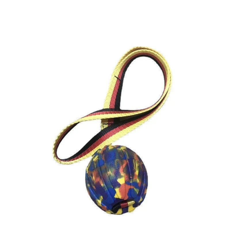 EVA floating dog training ball in camouflage colour and yellow, shown in 65mm, 7cm, and 9cm diameter sizes.
