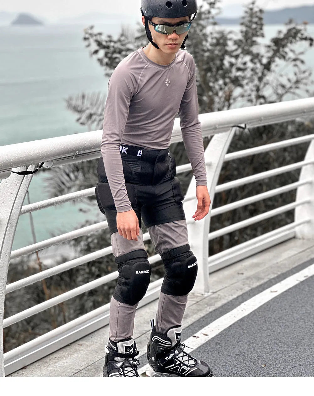 Black adult hip protection pad with NBR foam panels for roller skating and skateboarding