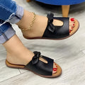 Ladies casual sandals in fish mouth slipper style with a bow, in black, pink, and gold colour options.