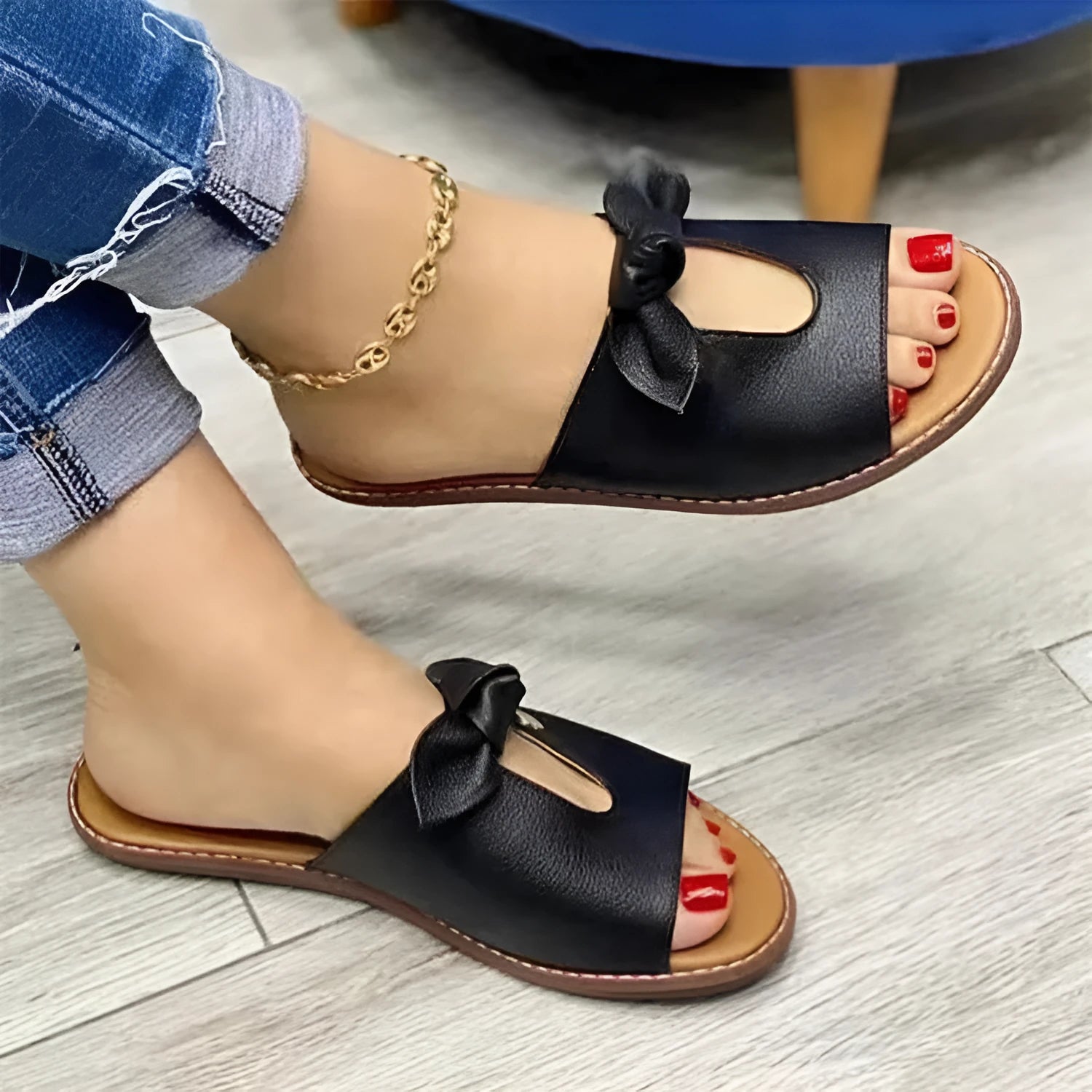 Ladies casual sandals in fish mouth slipper style with a bow, in black, pink, and gold colour options.