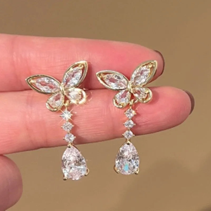 Platinum coloured bow stud earrings with electroplated finish on zinc alloy